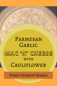 Pinterest image for the blog post "Parmesan Garlic Mac 'm' Cheese with Cauliflower." Image of mac 'n' cheese in a pot on an orange background. Article title is in a large yellow circle in the middle with website name "Funky Crunchy Mama" along the bottom.