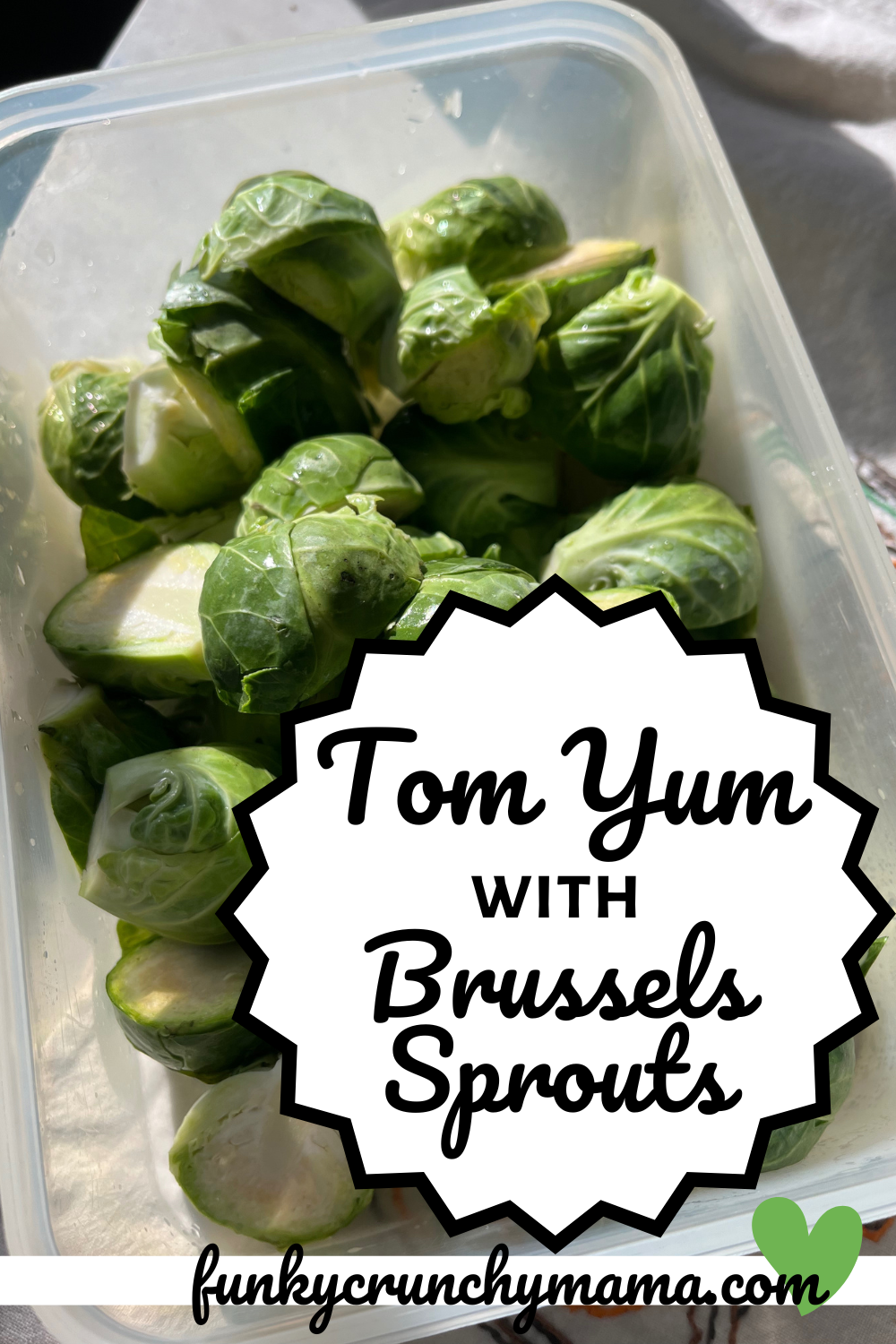 Pinterest image. Image shows a bowl of fresh Brussels sprouts with the title "tom yum with Brussels sprouts" in a medallion shape.